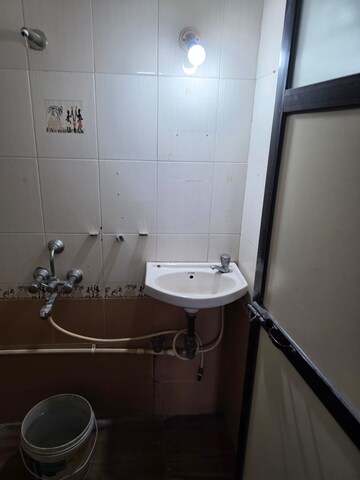 Bathroom in 1.5 BHK Apartment at Paranjape Schemes Royal Court, Andheri East – for Rent