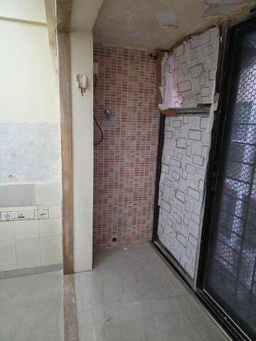 Bathroom in 1.5 BHK Apartment at Paranjape Schemes Royal Court, Andheri East – for Rent