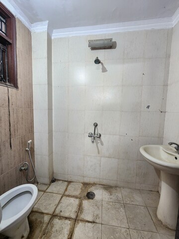 Bathroom in 2 BHK Builder Floor at Chattarpur – for Rent