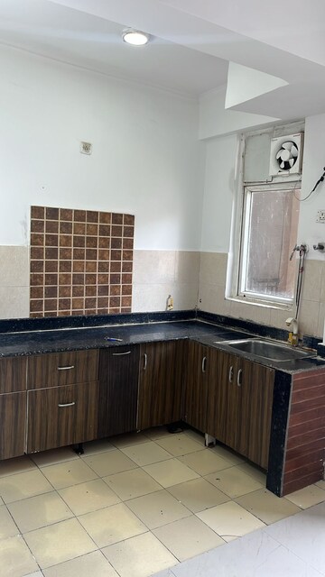 Kitchen in 2 BHK Apartment at Mahagun Mirabella, Sector 79 – for Rent