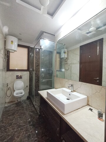Bathroom in 4 BHK Builder Floor at Kailash Colony – for Rent