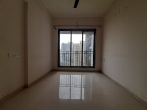 Room in 1 BHK Apartment at Gulmohar CHS Goregaon, Goregaon West – for Rent