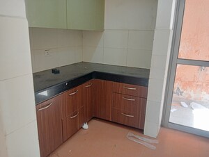 Kitchen in 2 BHK Apartment at Unitech Uniworld Gardens 2, Sector 47 – for Rent