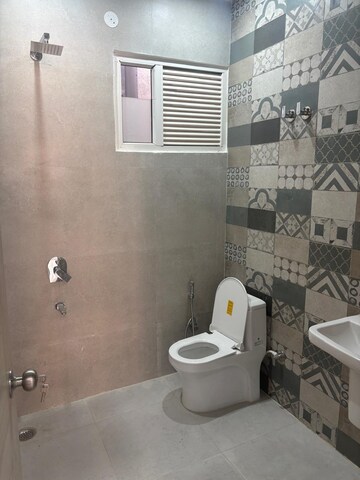 Bathroom in 4 BHK Builder Floor at Sahastradhara Road – for Rent