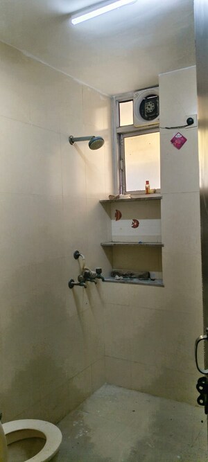 Attached Bathroom in 2 BHK Apartment at Charms Castle, Raj Nagar Extension – for Sale
