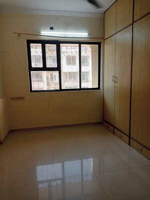 Room in 2 BHK Apartment at Dheeraj Ganga, Malad West – for Rent