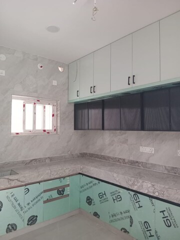 Kitchen in 2 BHK Apartment at Amrapali Princely Estate, Sector 76 – for Sale