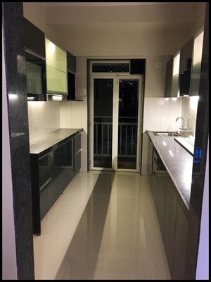 Kitchen in 3 BHK Apartment at Conwood Enclave, Vasant Vihar – for Sale