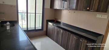 Kitchen in 2 BHK Apartment at Ani Anu Sri Balaji Enclave, Malad West – for Sale