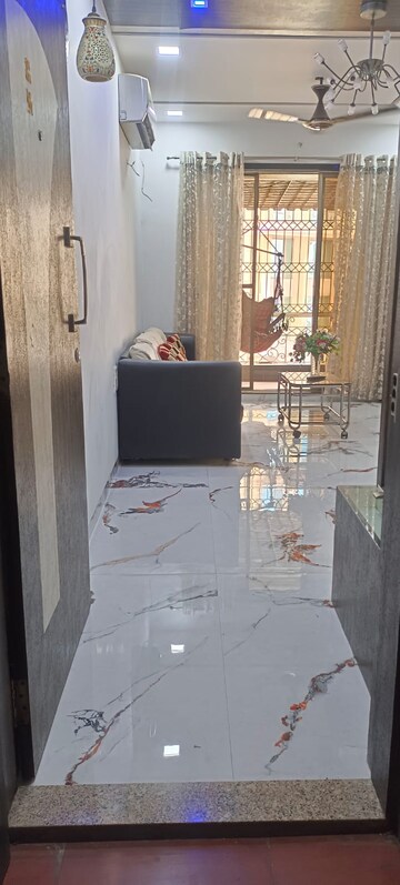 Living Room in 2 BHK Apartment at Ravechi Heights, Kharghar – for Sale