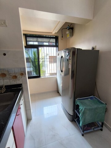 Living Room in 1 BHK Apartment at Abrol House, Malad West – for Rent