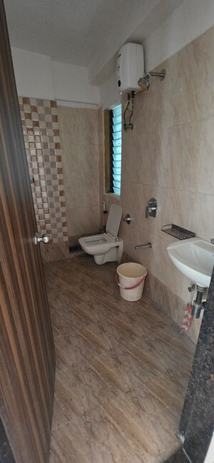 Bathroom in 2 BHK Apartment at Ami Zarna, Malad West – for Sale