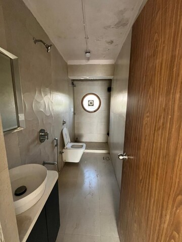 Bathroom in 2 BHK Apartment at Marine View CHSL, Andheri West – for Rent