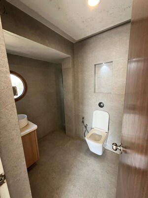 Bathroom in 2 BHK Apartment at Marine View CHSL, Andheri West – for Rent