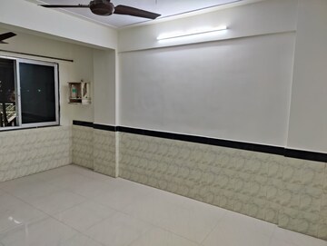 Kitchen in 1 BHK Apartment at Kirtikar CHS, Ganeshwadi – for Sale
