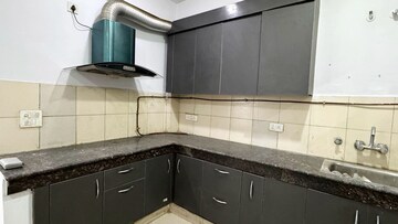 Kitchen in 2 BHK Apartment at Gulshan Bellina, Sector 16 Greater Noida – for Rent