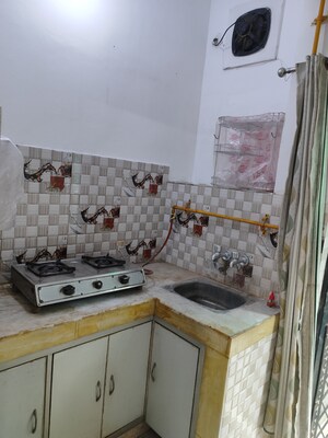 Kitchen in 1 RK Apartment at AWHO Brahmaputra Apartments, Sector 29 – for Rent