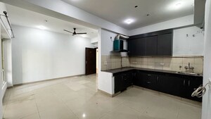 Kitchen in 2 BHK Apartment at RG Luxury Homes, Sector 16b Greater Noida – for Rent