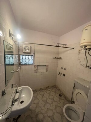 Bathroom in 3 BHK Apartment at Vasant Kunj – for Rent