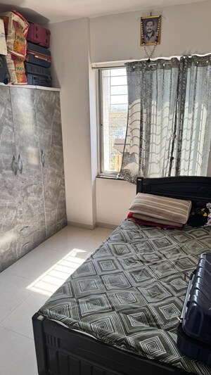 Bedroom in 2 BHK Apartment at Golden Winds, Lohgaon – for Rent