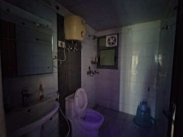 Bathroom in 2.5 BHK Apartment at Gulshan Bellina, Sector 16 Greater Noida – for Rent