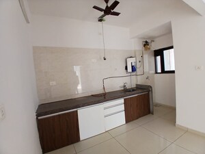 Kitchen in 2 BHK Apartment at Duville Riverdale Heights, Kharadi – for Rent