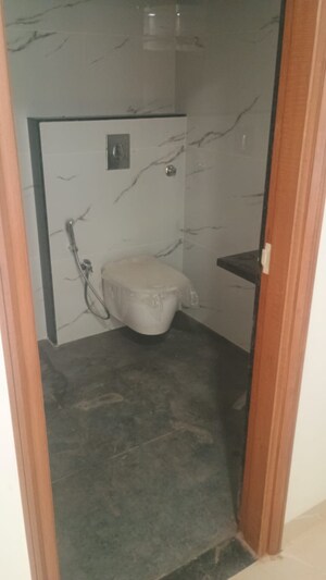 Bathroom in 3 BHK Apartment at Tilak Nagar – for Sale