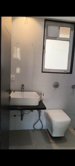 Bathroom in 2 BHK Apartment at Paranjape Schemes Royal Court, Andheri East – for Rent