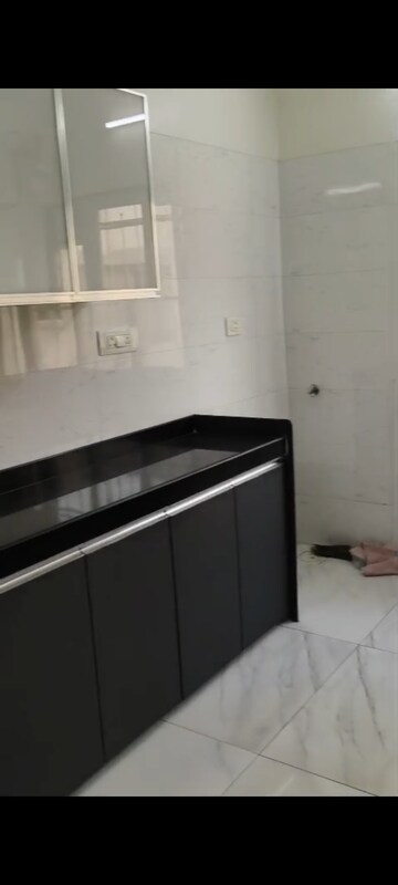 Kitchen in 2 BHK Apartment at Paranjape Schemes Royal Court, Andheri East – for Rent