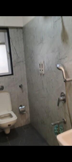 Bathroom in 2 BHK Apartment at Paranjape Schemes Royal Court, Andheri East – for Rent