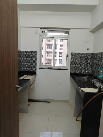 Kitchen in 1 BHK Apartment at Lodha Amara, Kolshet Road – for Rent