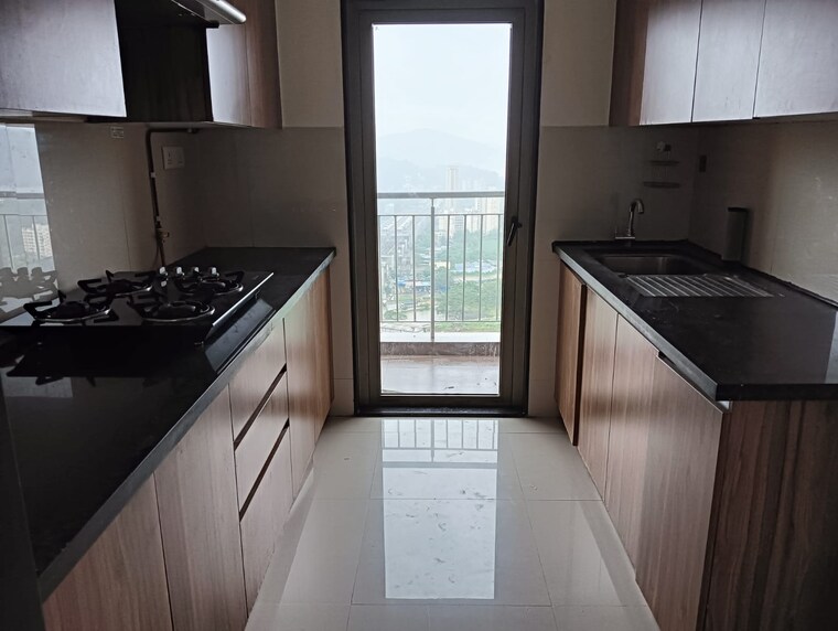Kitchen, lodha-vivant 2 Bedroom 771 Sq.Ft. Apartment In Ghodbunder Road Thane 9686805