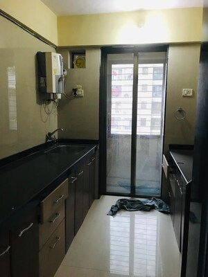 Kitchen in 1 BHK Apartment at Kiran Towers, Malad West – for Sale
