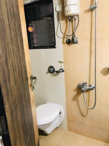 Bathroom in 1 BHK Apartment at Kiran Towers, Malad West – for Sale