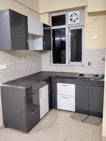 Kitchen in 1.5 BHK Apartment at Auric City Homes, Sector 82 – for Rent