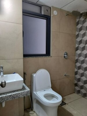 Bathroom in 2 BHK Apartment at Kalpataru Immensa, Kolshet Road – for Rent
