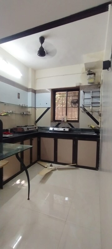 Kitchen in 1 BHK Apartment at Panchamrut CHS Thane, Ghodbunder Road – for Rent