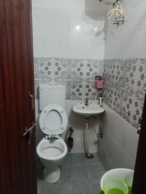 Bathroom in 2 BHK Apartment at Raja Park – for Sale