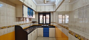 Kitchen in 2 BHK Apartment at Aishwarya Building, Andheri West – for Rent