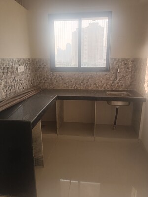 Kitchen in 1 BHK Apartment at Prarthana Rajkamal Park, Parel – for Sale