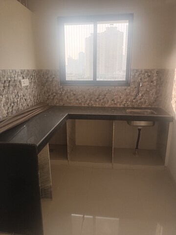 Kitchen in 1 BHK Apartment at Prarthana Rajkamal Park, Parel – for Sale