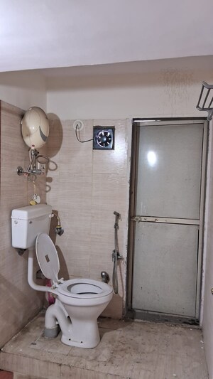 Bathroom in 3 BHK Apartment at Sanghvi Hills, Ghodbunder Road – for Rent