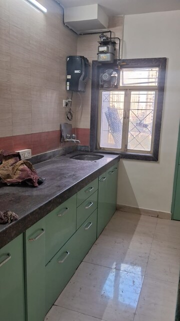 Kitchen in 3 BHK Apartment at Sanghvi Hills, Ghodbunder Road – for Rent