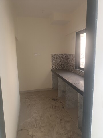 Kitchen in 1 BHK Apartment at Prarthana Rajkamal Park, Parel – for Sale