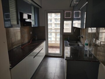 Kitchen in 3 BHK Apartment at Amrapali Crystal Homes, Sector 76 – for Rent