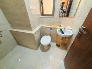 Bathroom in 3 BHK Apartment at Sheth Auris Serenity Tower 3, Malad West – for Rent