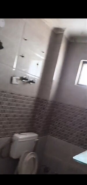 Bathroom in 3 BHK Builder Floor at Mahavir Enclave – for Sale