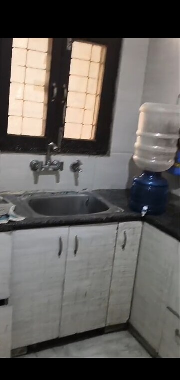 Kitchen in 3 BHK Builder Floor at Mahavir Enclave – for Sale