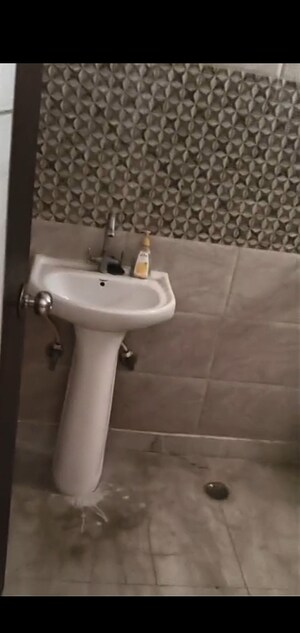 Bathroom in 3 BHK Builder Floor at Mahavir Enclave – for Sale