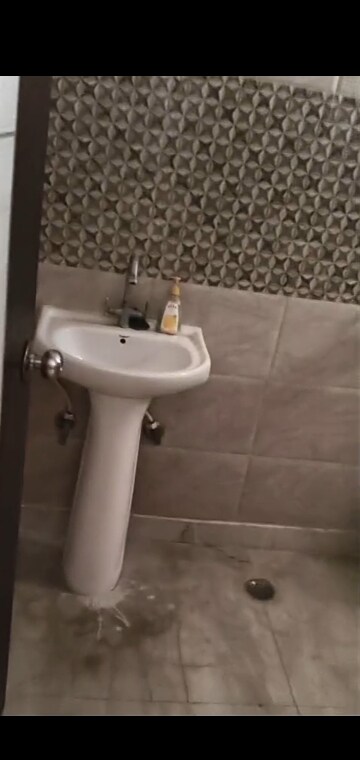 Bathroom in 3 BHK Builder Floor at Mahavir Enclave – for Sale